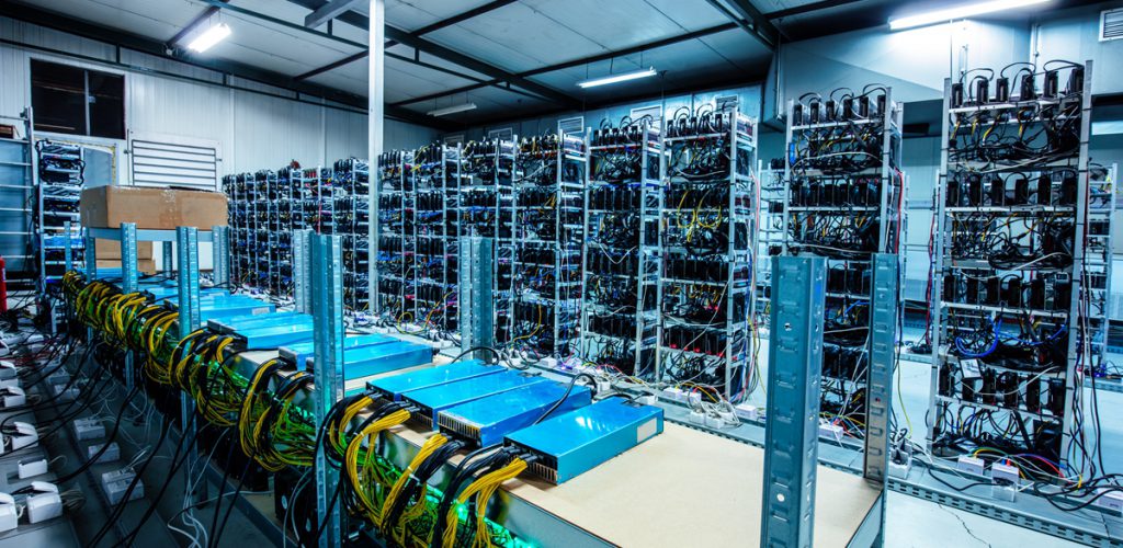 Bitcoin and crypto mining farm. Big data center. High tech server computers at work
